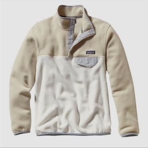 Patagonia pullover. I’ve worn this maybe 3 times. It does not have any stains.